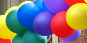 Brightly colored balloons outside